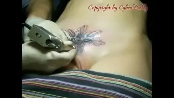 Watch tattoo created on the vagina total Tube
