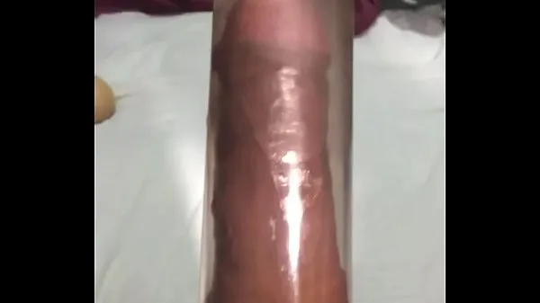Sledovat celkem Stretching my penis with a pump Tube