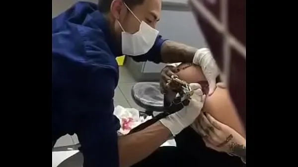 Watch WOMAN TATTOOS HER ASS link full video total Tube