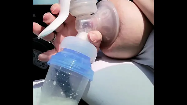 Watch Pumping my milk tits empty in the car total Tube