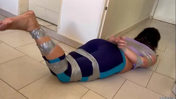 Watch Ball Gagged Girl Struggle In Barefoot Tape Bondage total Tube