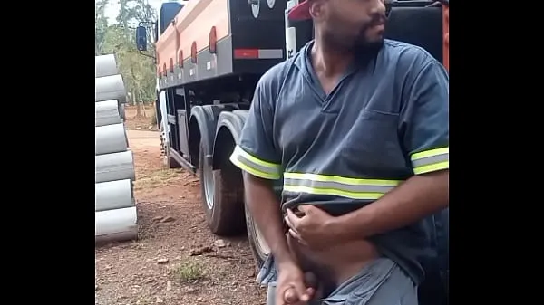 Sledovat celkem Worker Masturbating on Construction Site Hidden Behind the Company Truck Tube